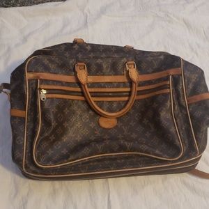 Expandable Louis Vuitton rolling luggage